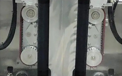 Λεπτομέρεια μηχανής συσκευασίας θήκης gusset - Συγχρονισμένος τροχός τραβήγματος τσάντας